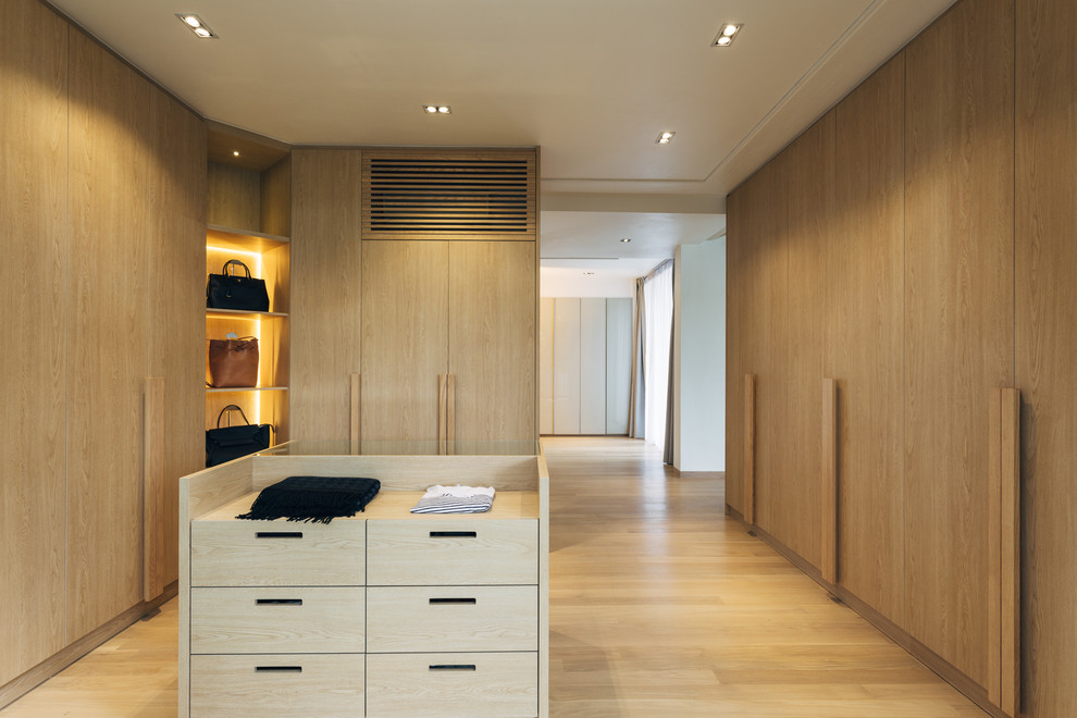 Photo of a contemporary storage and wardrobe in Singapore.