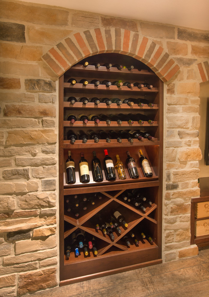 This is an example of a midcentury wine cellar in Columbus.