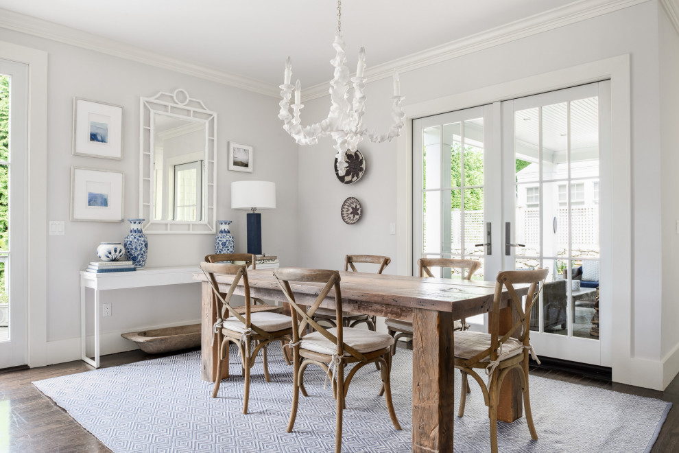 Inspiration for a transitional dark wood floor and brown floor dining room remodel in Los Angeles with gray walls