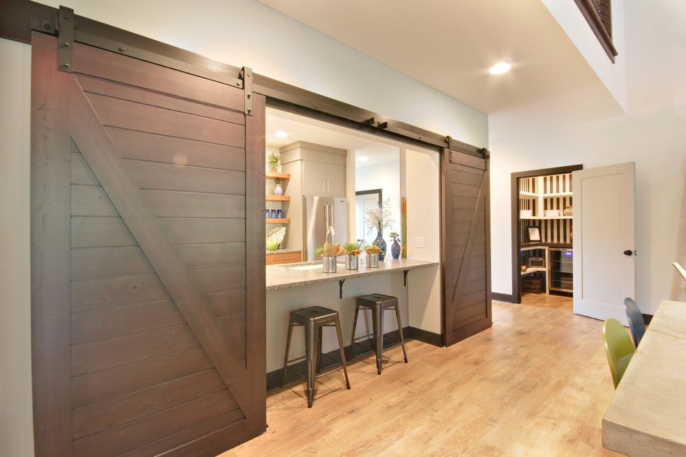 Example of a transitional kitchen design in Grand Rapids