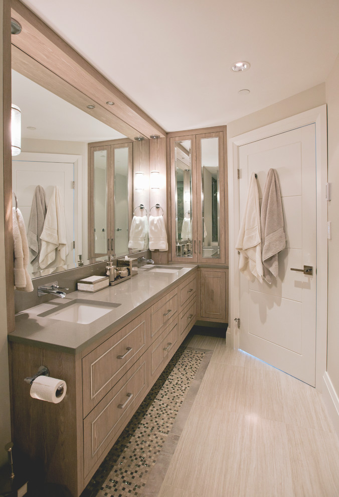 Design ideas for a mid-sized contemporary master bathroom in Vancouver with a drop-in sink, flat-panel cabinets, light wood cabinets, onyx benchtops, an alcove shower, a two-piece toilet, gray tile, porcelain tile, grey walls and porcelain floors.