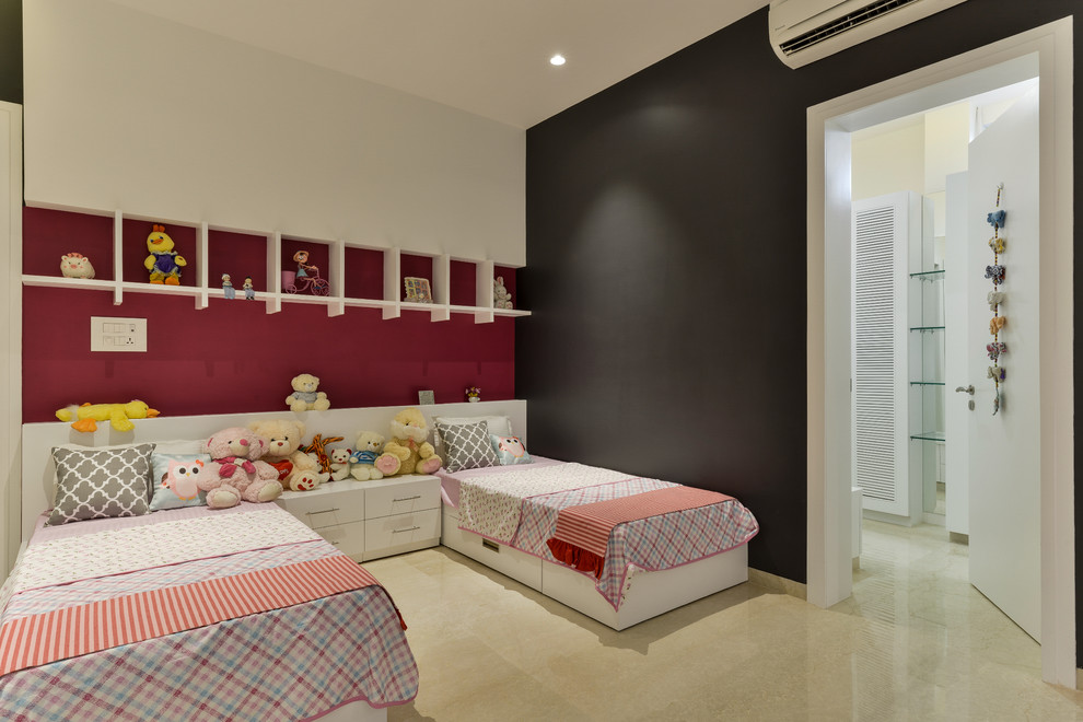 Photo of a mid-sized asian kids' bedroom in Bengaluru with black walls and beige floor.
