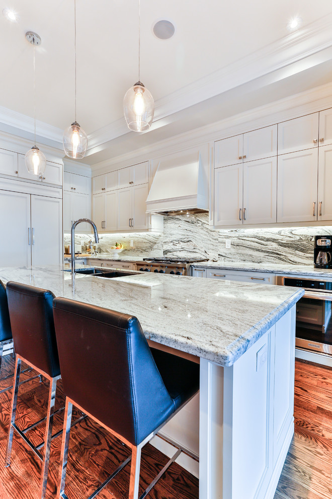 Example of a transitional kitchen design in Toronto