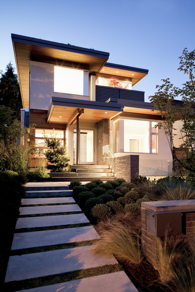 Photo of a contemporary two-storey exterior in Vancouver.