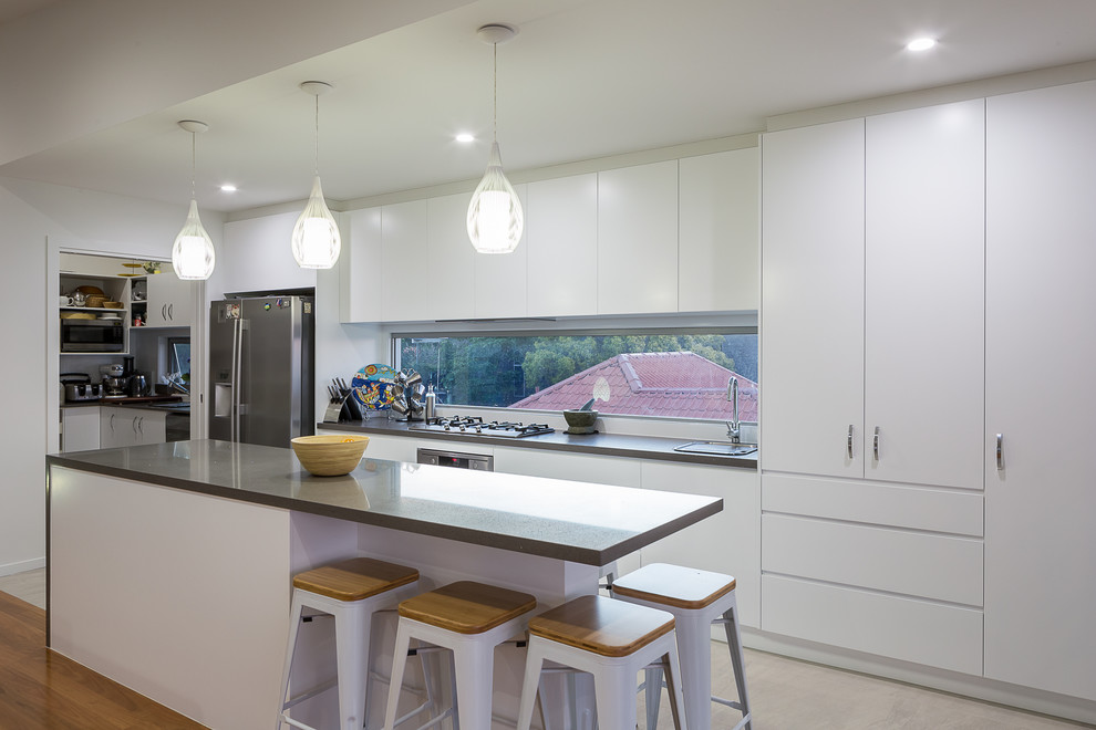 Photo of a beach style kitchen in Brisbane.