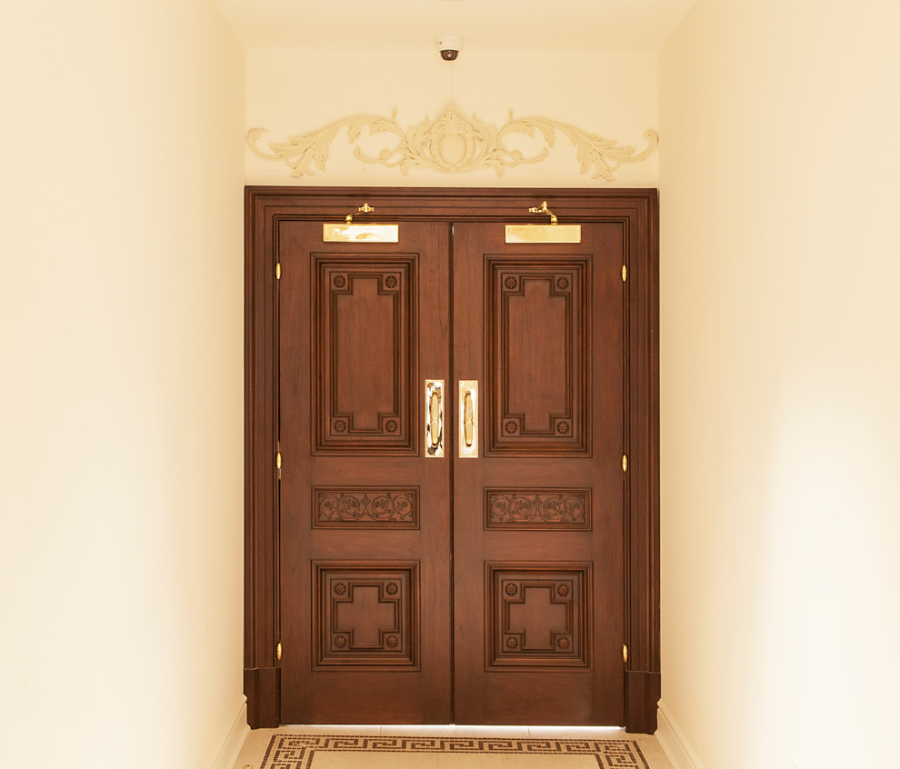 Example of a small transitional ceramic tile and beige floor double front door design in New York with a dark wood front door and beige walls