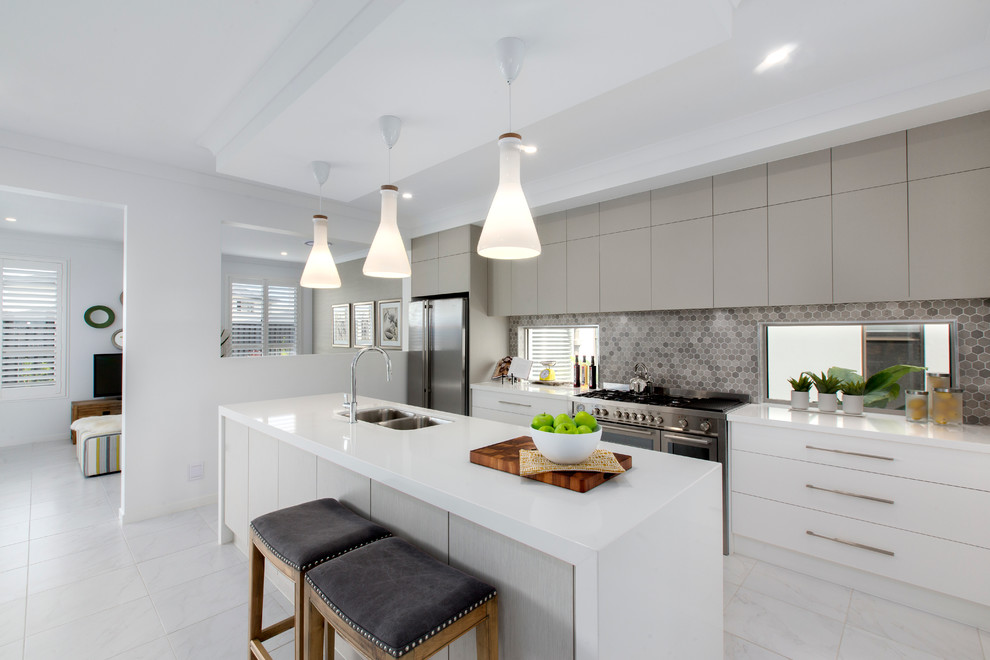 Inspiration for a contemporary kitchen in Brisbane with light wood cabinets.