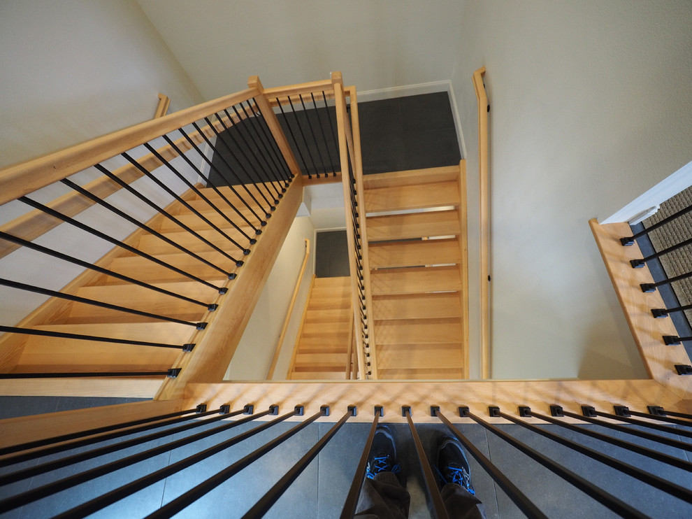 Design ideas for a large contemporary wood u-shaped staircase in Other with open risers.