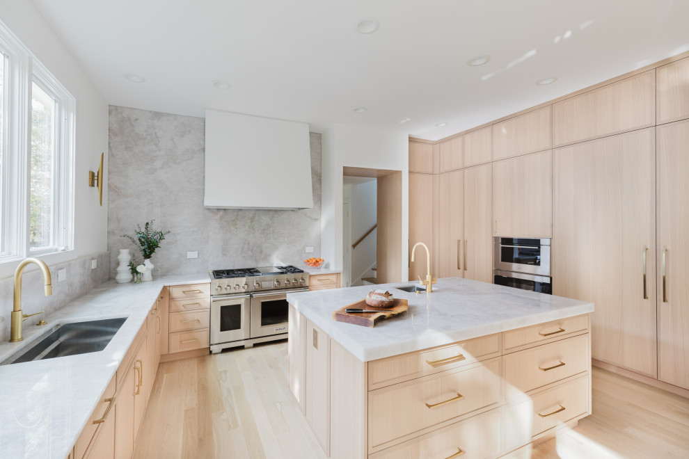 Light Oak Modern Kitchen With Full-Height Pantry Wall & Waterfall Island