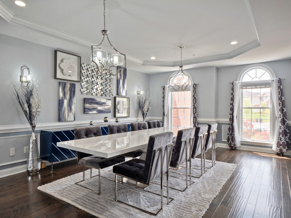 Inspiration for a large contemporary separate dining room in DC Metro with grey walls, dark hardwood floors, no fireplace, brown floor, recessed and decorative wall panelling.