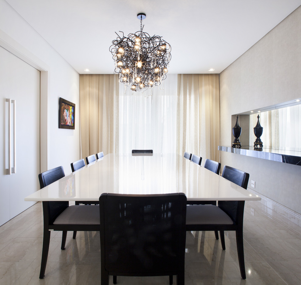 This is an example of a contemporary separate dining room in Other with white walls.
