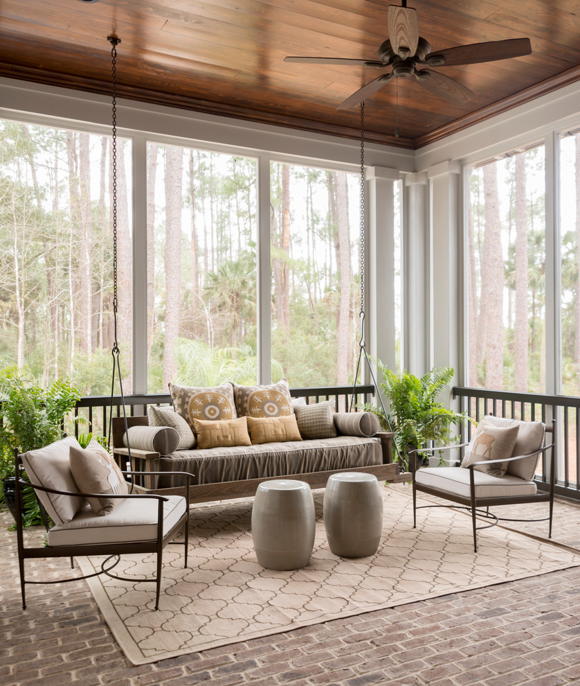 Large transitional brick floor and gray floor sunroom photo in Charleston with a standard ceiling
