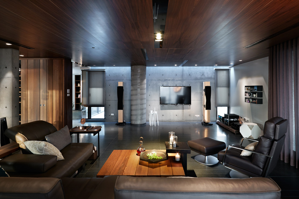 Design ideas for a large asian open concept living room in Stuttgart with grey walls and a wall-mounted tv.