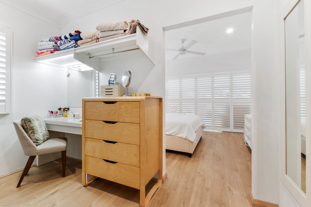 This is an example of a contemporary storage and wardrobe in Perth.