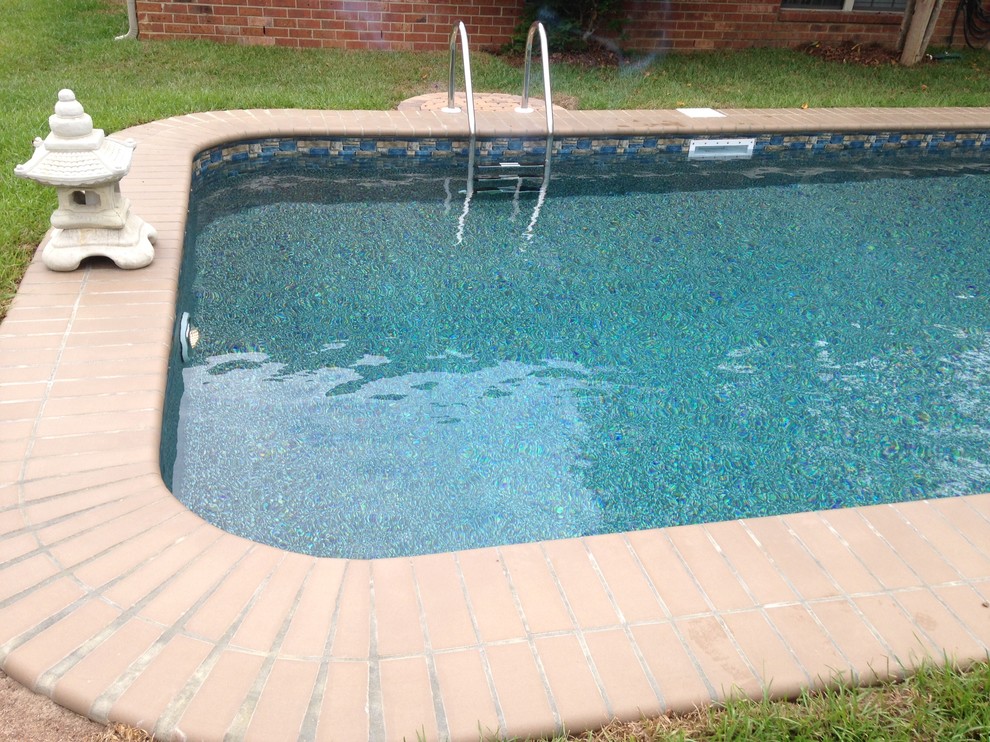Inspiration for a transitional pool remodel in Miami