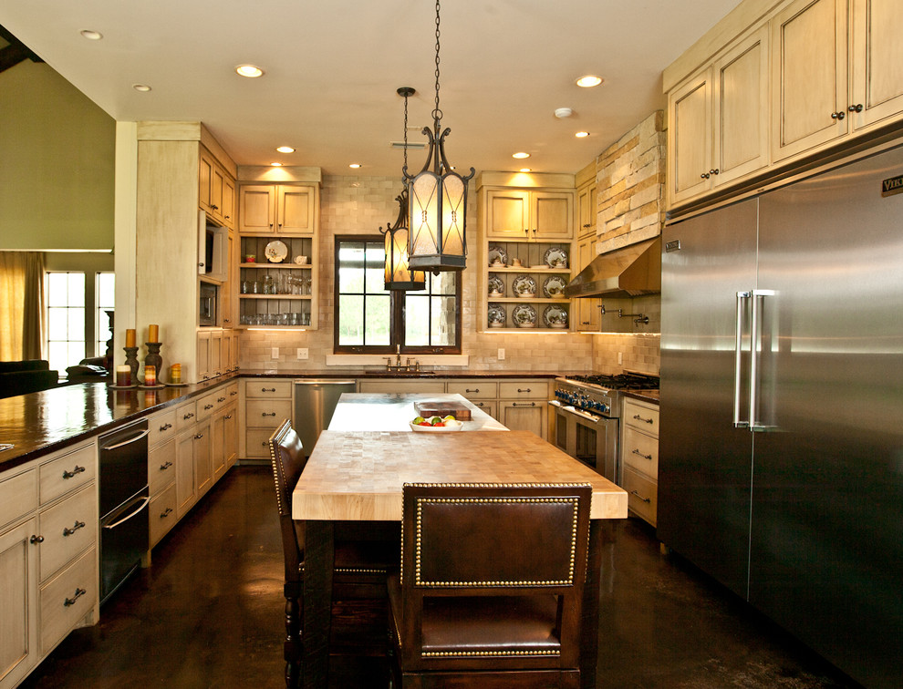 Photo of a contemporary kitchen in Atlanta with wood benchtops and yellow cabinets.