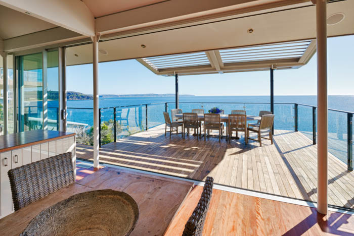 This is an example of a large beach style deck in Sydney.
