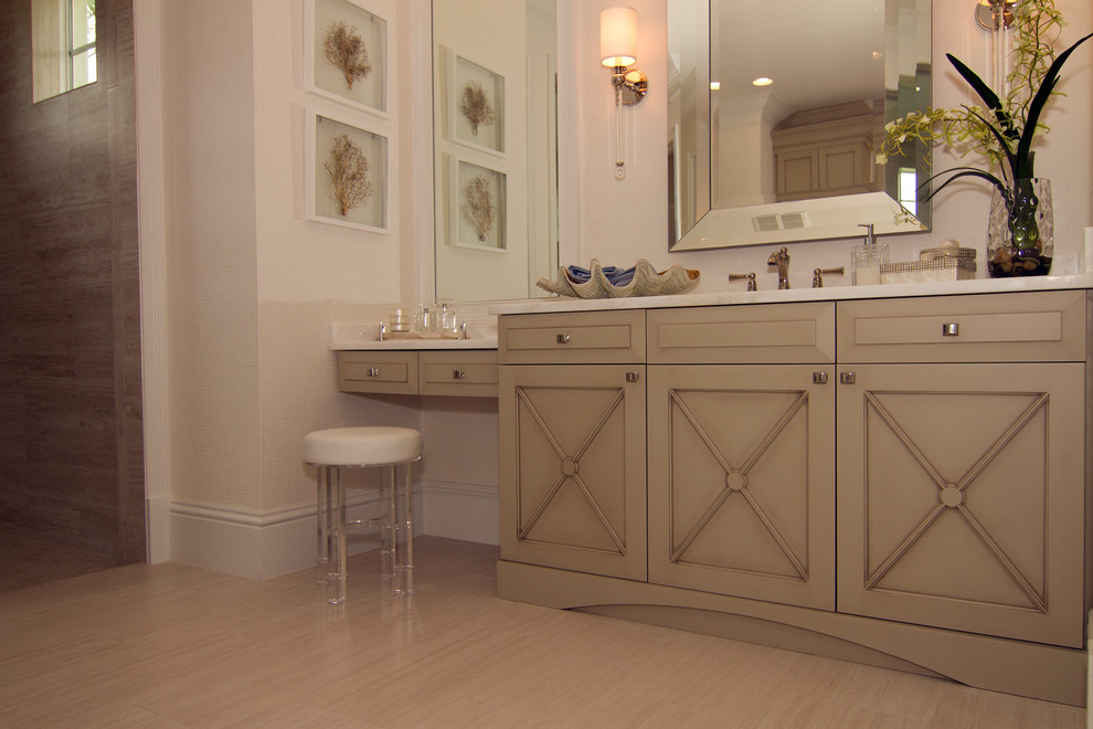 Inspiration for a large beach style master bathroom in Tampa with shaker cabinets, grey cabinets, a freestanding tub, a double shower, a one-piece toilet, white tile, subway tile, beige walls, ceramic floors, an undermount sink, marble benchtops, beige floor and an open shower.