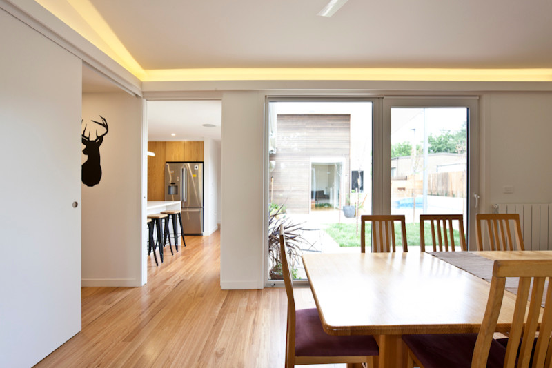 This is an example of a contemporary dining room in Canberra - Queanbeyan.