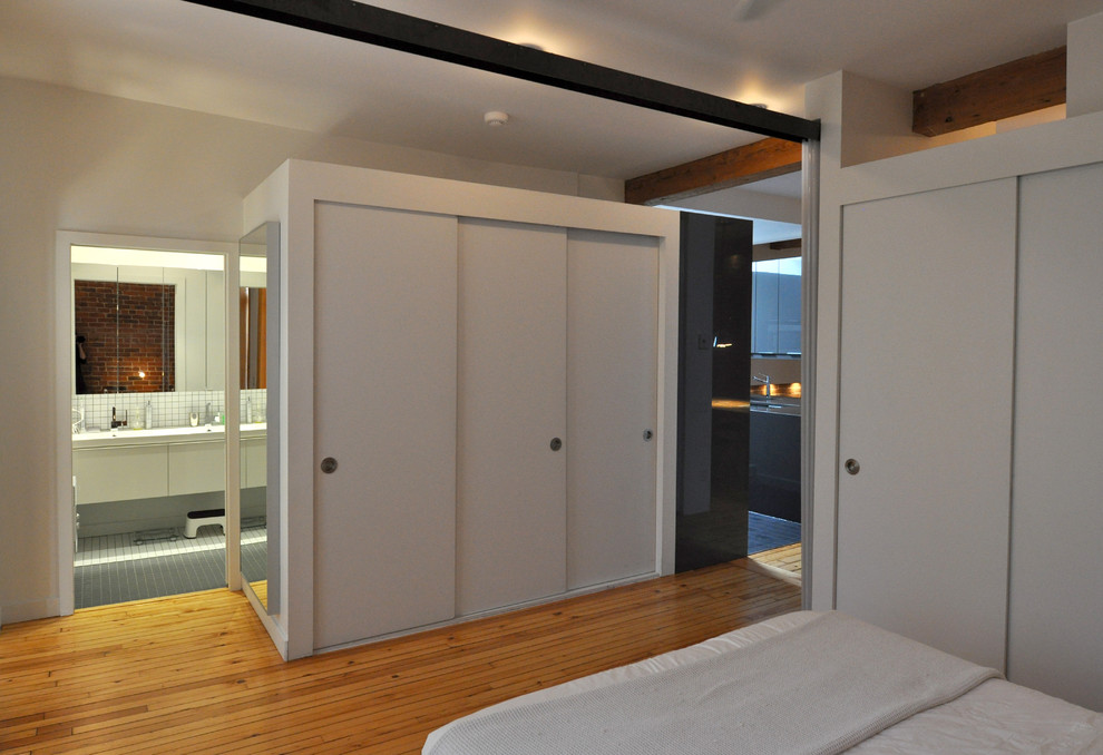 Photo of a modern bedroom in Montreal.
