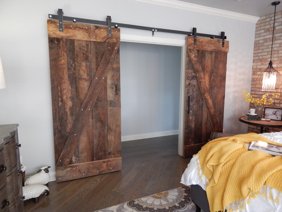 This is an example of an industrial master bedroom.
