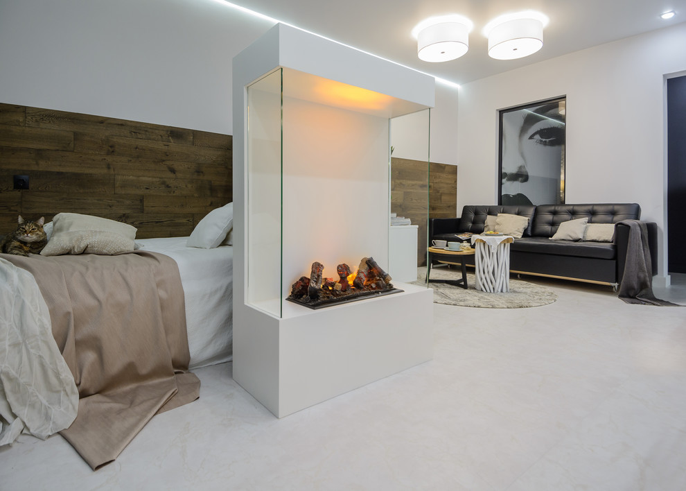 Design ideas for a small contemporary master bedroom in Novosibirsk with white walls, a ribbon fireplace, a metal fireplace surround and white floor.