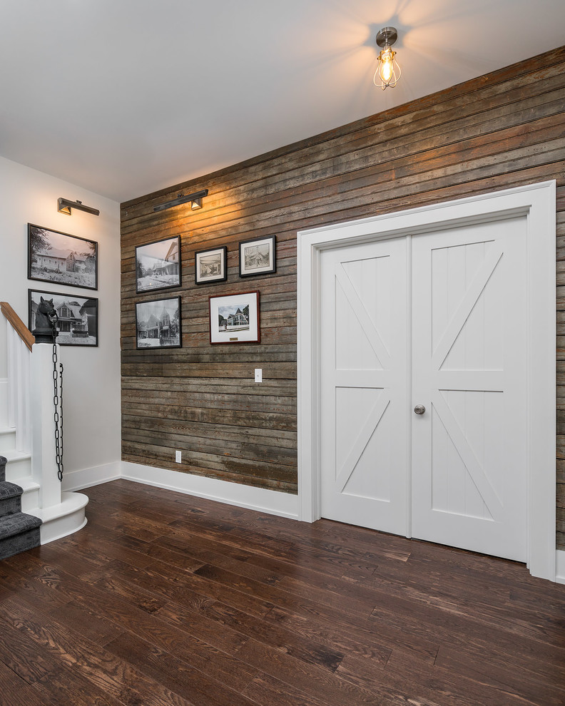 Mid-sized transitional u-shaped dark wood floor and brown floor open concept kitchen photo with an undermount sink, shaker cabinets, white cabinets, quartz countertops, white backsplash, ceramic backsplash, stainless steel appliances and an island