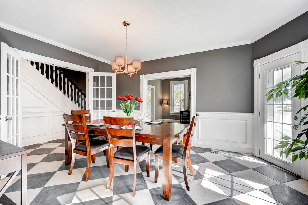 Design ideas for a medium sized traditional enclosed dining room in Baltimore with grey walls, porcelain flooring, no fireplace and multi-coloured floors.