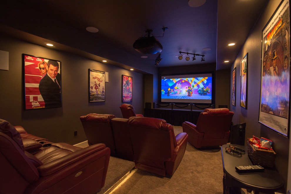 Transitional enclosed home theatre in Seattle with carpet, a projector screen and grey walls.