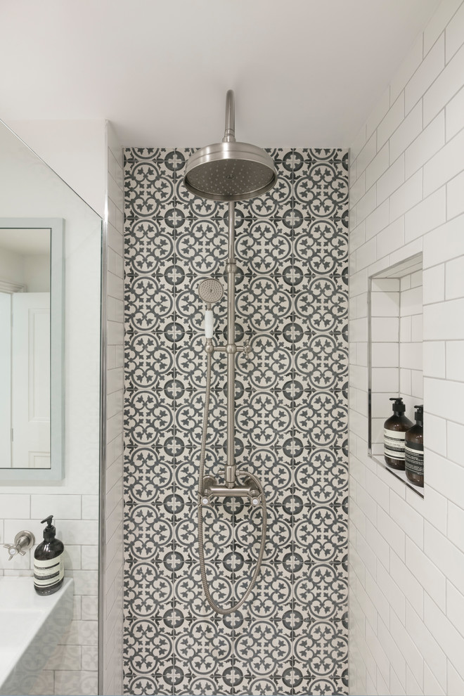 Inspiration for a small scandinavian 3/4 bathroom in London with an open shower, white tile, cement tile, white walls, cement tiles, a wall-mount sink, white floor and an open shower.