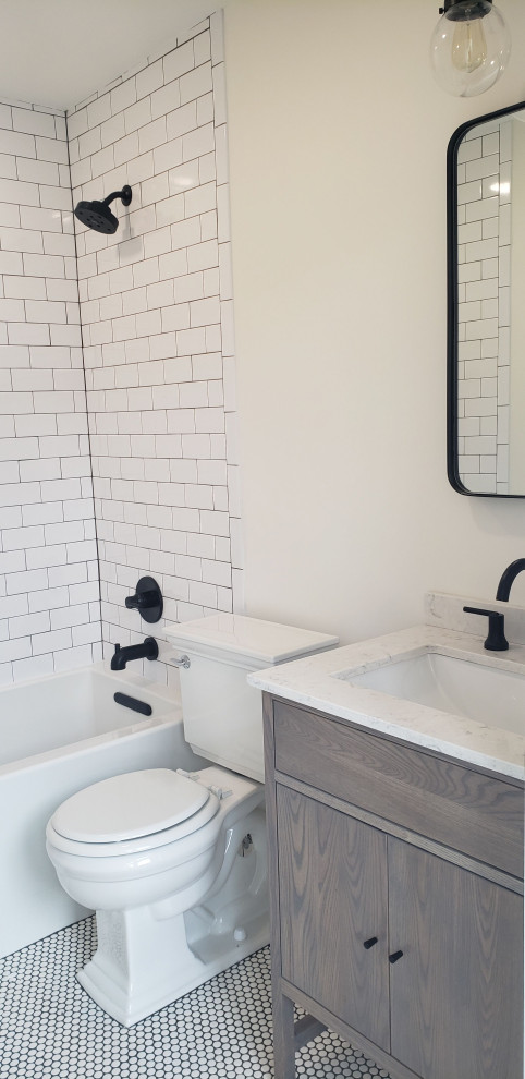 Design ideas for a mid-sized scandinavian master bathroom in New York with furniture-like cabinets, medium wood cabinets, an alcove tub, a shower/bathtub combo, a one-piece toilet, white tile, ceramic tile, white walls, ceramic floors, a drop-in sink, quartzite benchtops, white floor, an open shower and yellow benchtops.