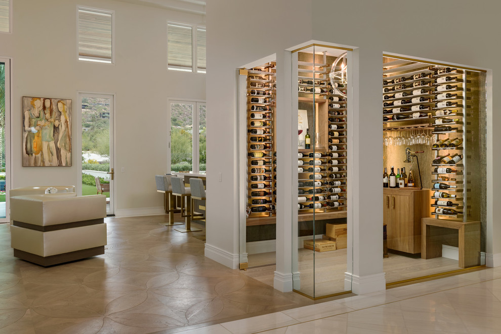Inspiration for a contemporary wine cellar in Phoenix with storage racks and beige floor.