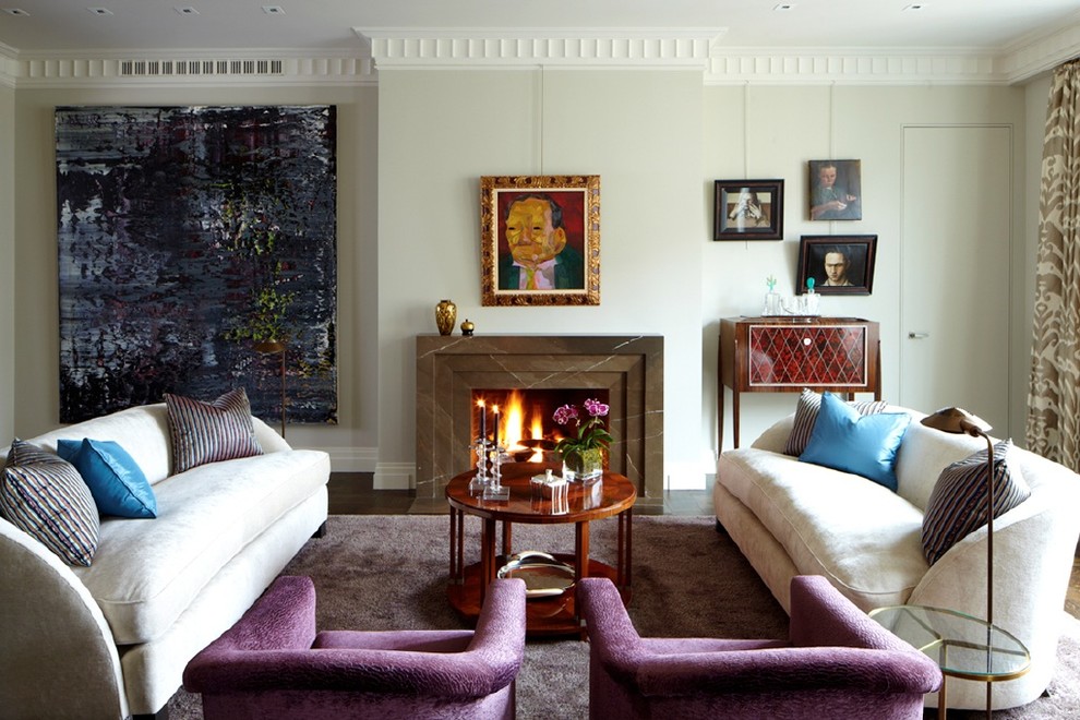 Transitional formal living room in New York with beige walls, a standard fireplace and no tv.