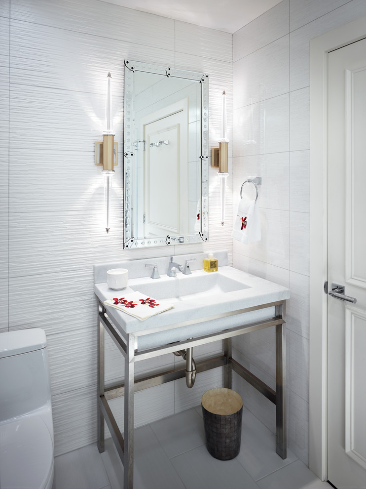 Inspiration for a mid-sized contemporary 3/4 bathroom in Other with a one-piece toilet, white tile, white walls, a pedestal sink and white floor.
