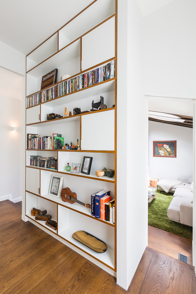 Photo of a contemporary Open Concept living room in Auckland With Yellow Walls.