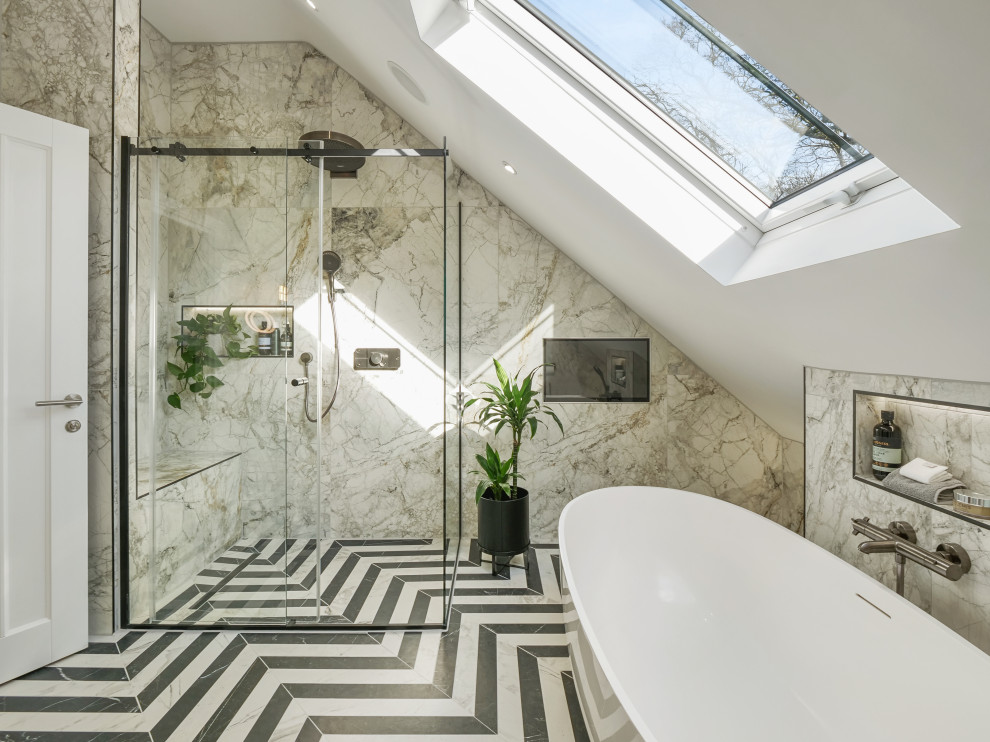 Photo of a large eclectic kids bathroom in Essex with a freestanding tub, a corner shower, beige tile, marble, beige walls, ceramic floors, marble benchtops, multi-coloured floor, a sliding shower screen and a single vanity.