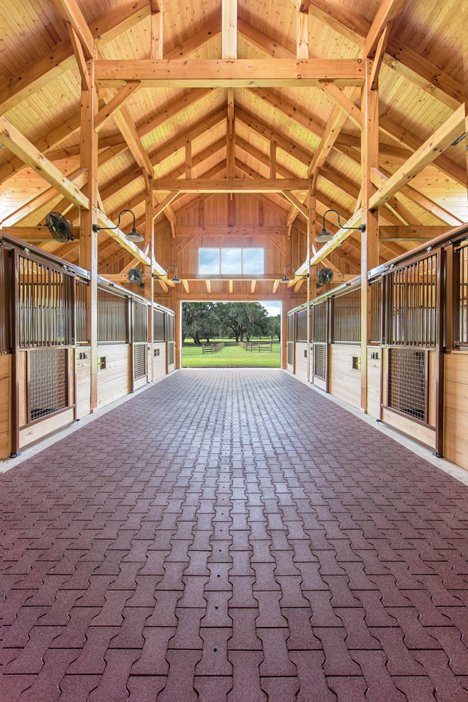 Inspiration for a large rustic two-story wood beige home design remodel