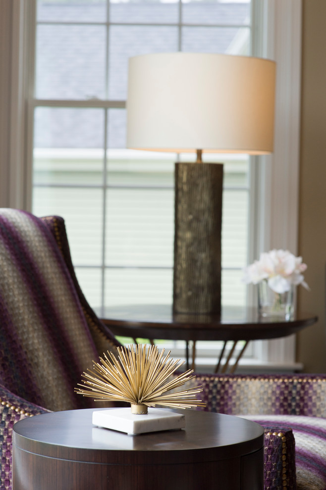 This is an example of an expansive modern open concept family room in Boston with purple walls, dark hardwood floors, a freestanding tv and brown floor.