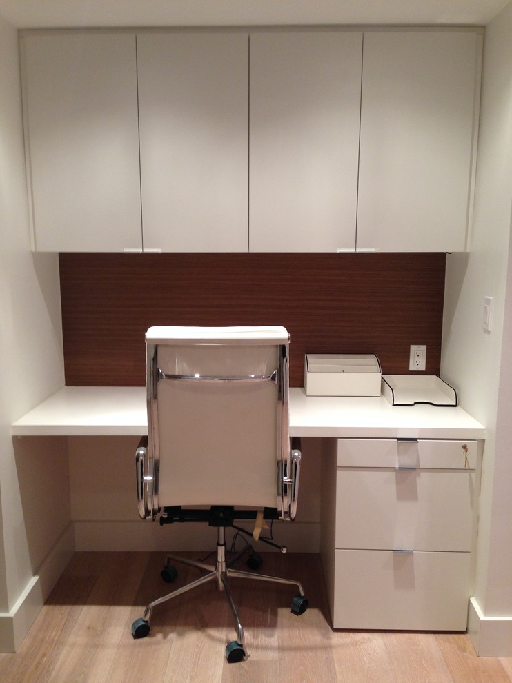 Photo of a small contemporary home office in Miami.