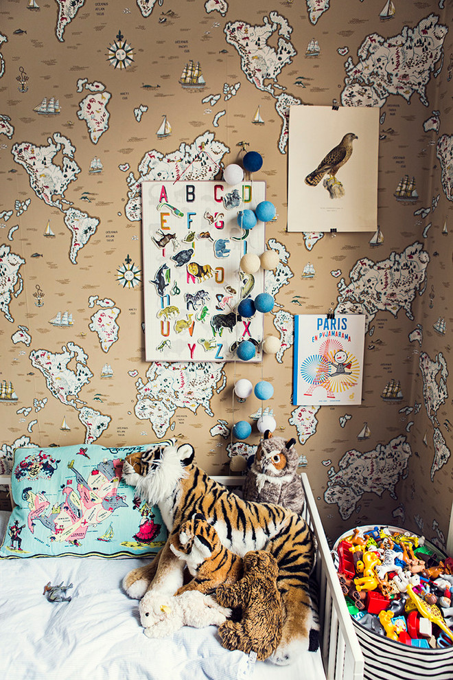 Photo of a small eclectic gender-neutral kids' bedroom for kids 4-10 years old in Stockholm with multi-coloured walls.
