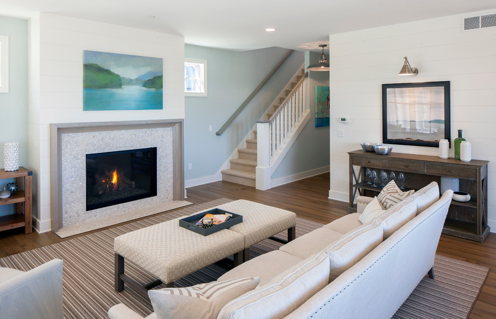 This is an example of a beach style family room in Grand Rapids.