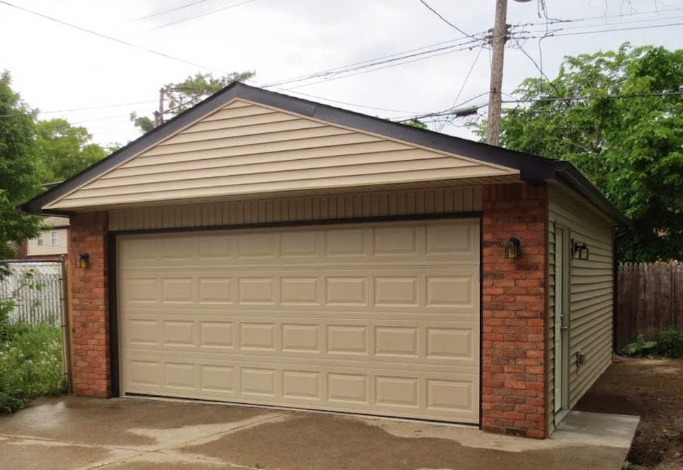 Photo of a large traditional detached two-car carport in Detroit.