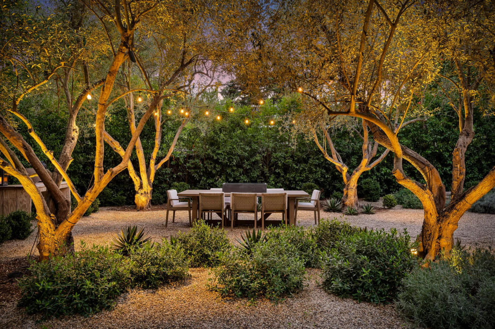 Inspiration for a transitional backyard gravel patio remodel in Santa Barbara