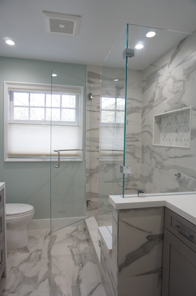 Trendy porcelain tile bathroom photo in San Francisco with shaker cabinets, gray cabinets and quartz countertops
