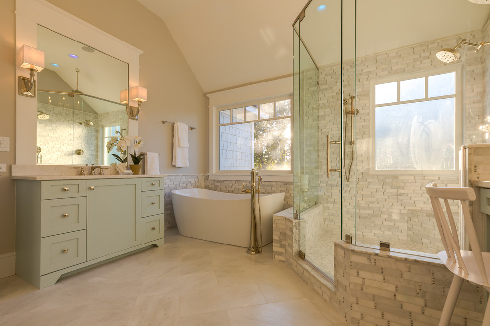 Photo of a mid-sized modern master bathroom in Other with shaker cabinets, grey cabinets, an alcove shower, a two-piece toilet, white tile, marble, grey walls, concrete floors, an undermount sink, engineered quartz benchtops, grey floor, a sliding shower screen and white benchtops.