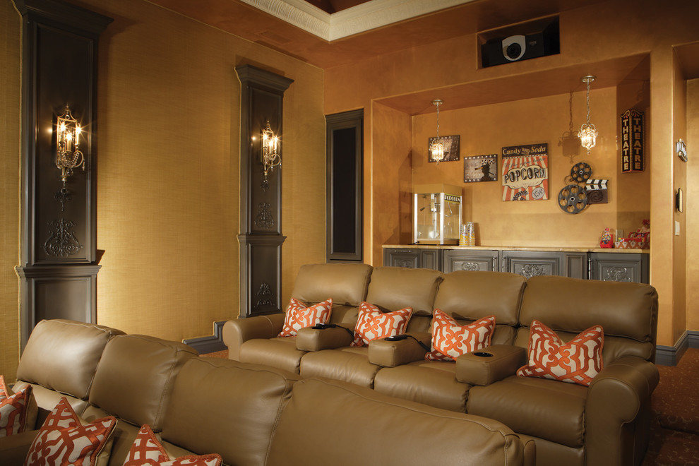 Photo of a mid-sized traditional enclosed home theatre in Phoenix with beige walls, carpet, a projector screen and brown floor.