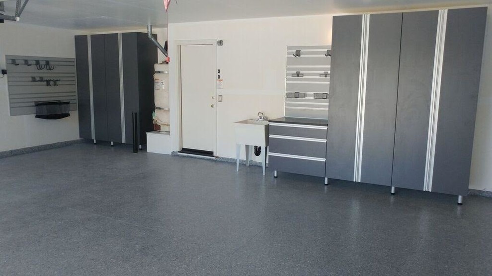 Garage - mid-sized traditional attached two-car garage idea in Sacramento