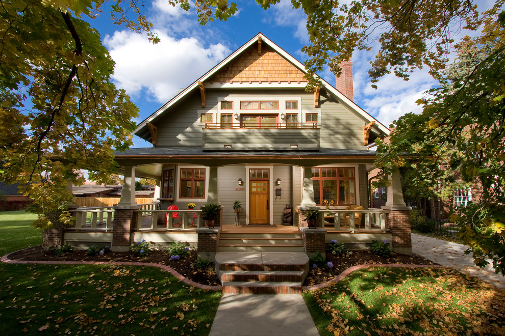 Inspiration for an arts and crafts exterior in Wilmington with wood siding and a gable roof.