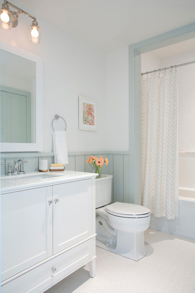 This is an example of a transitional bathroom in San Francisco with a shower/bathtub combo.