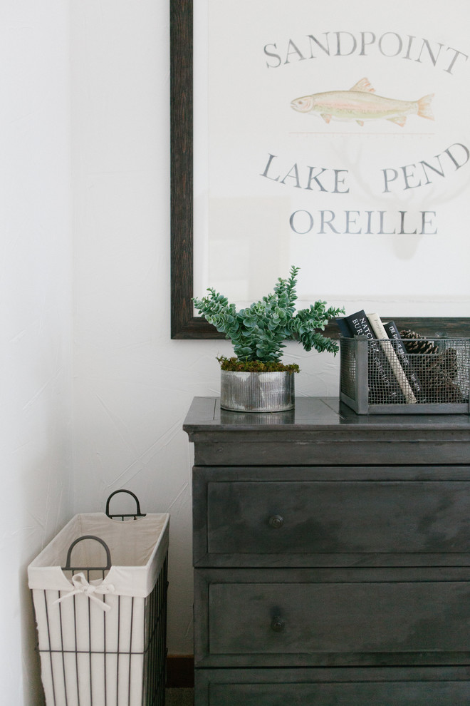 Inspiration for a rustic guest carpeted home design remodel in Orange County with white walls
